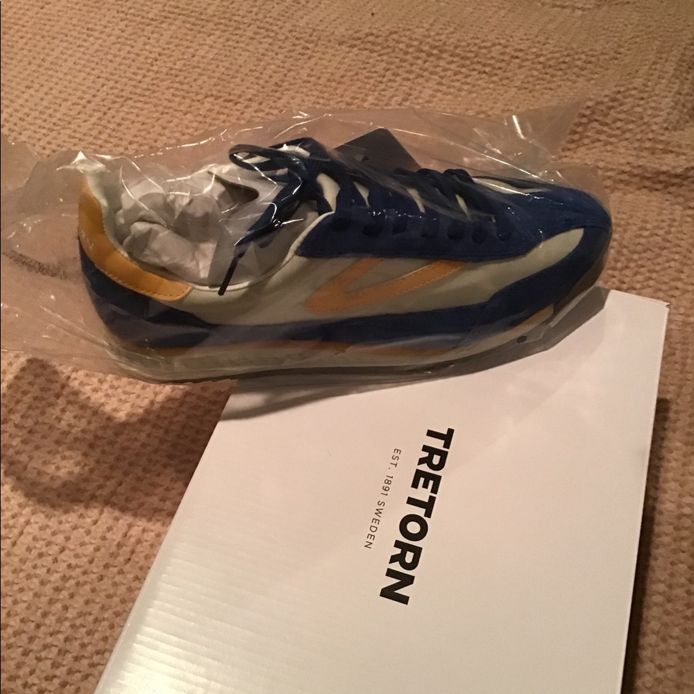 Never worn Tretorn sneakers. 9.5.
